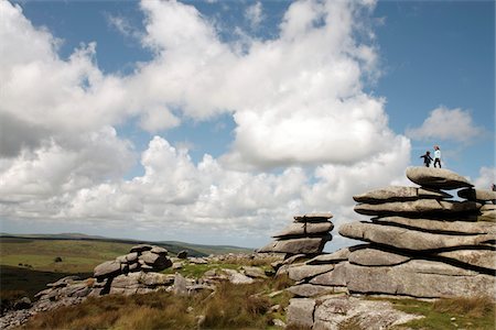 England, Cornwall, Bodmin Moor. Children on top of the Cheesewrings granite tors. Stock Photo - Rights-Managed, Code: 862-03731249