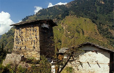 simsearch:862-03807589,k - India, Uttarakhand, Garhwal, Kharsali, nr Yamunotri. An ancient building in Kharsali village in the Yamuna Valley houses a Shiva temple. Stock Photo - Rights-Managed, Code: 862-03731350