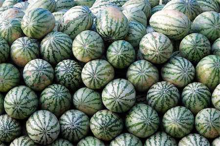 India, South India, Kerala. Watermelon stacked in a market in Cochin. Fotografie stock - Rights-Managed, Codice: 862-03731377