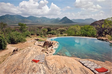 simsearch:862-03437947,k - Au Kenya, le piscine de roche naturelle de Sarara Camp, un ecolodge luxueux situé près des monts Mathews Photographie de stock - Rights-Managed, Code: 862-03731499