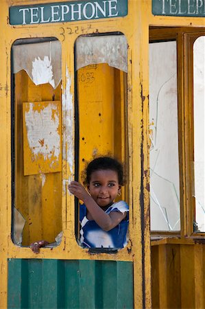 Kenya. The popularity of mobile phones has made most fixed-line telephone booths redundant. Stock Photo - Rights-Managed, Code: 862-03731537