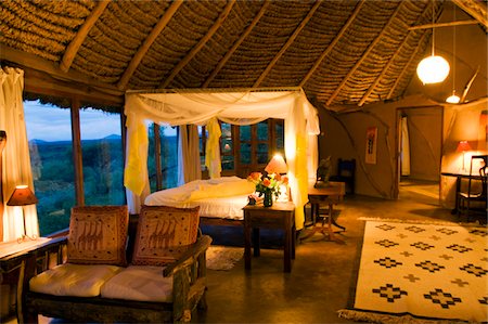 simsearch:862-03731582,k - Kenya, Laikipia, Lewa Downs.  Interior of guest cottage at Wilderness Trails safari lodge. Foto de stock - Con derechos protegidos, Código: 862-03731571