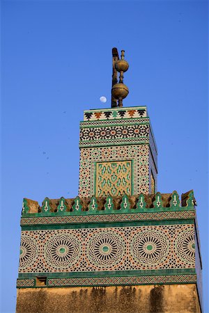 fez mosque - A Minaret with the early moon in the background; Old Medina in Fes, Morocco Stock Photo - Rights-Managed, Code: 862-03731837