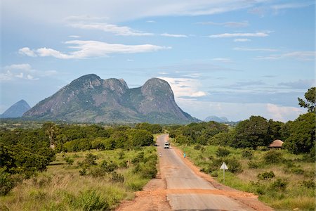 Mozambique, near Nampula. The long, pot-holed road towards Nampula. Stock Photo - Rights-Managed, Code: 862-03731884