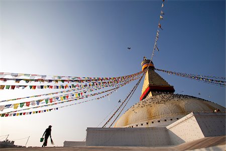 simsearch:862-03731971,k - Nepal. Kathmandu, Boudinath Stupa one of the holiest Buddhist sites in Kathmandu and one largest stupa's in the world Foto de stock - Con derechos protegidos, Código: 862-03731984