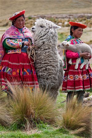 peruvian woman - Peru, Females with an alpaca and lamb at Abra La Raya, the highest point (4318m) on the  Andean Explorer  express train (Cusco-Puno) Stock Photo - Rights-Managed, Code: 862-03732096