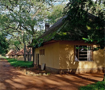 democratic republic of the congo - Built by the Belgians in colonial times, the attractive accommodation at Nagero, the headquarters of the Garamba National Park in northern Congo DRC. Stock Photo - Rights-Managed, Code: 862-03807344