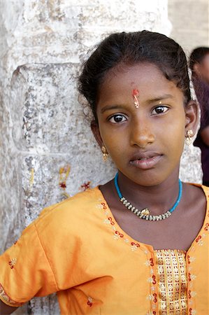 India, Tamil Nadu. Portrait of an Indian girl at the Minakshi Sundareshvara Temple. Stock Photo - Rights-Managed, Code: 862-03807495