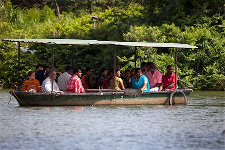 simsearch:862-03807550,k - Indien, Ranganathittu-Vogelschutzgebiet. Eine Gruppe von indischen Touristen machen Sie eine Bootstour durch Ranganathittu-Vogelschutzgebiet. Stockbilder - Lizenzpflichtiges, Bildnummer: 862-03807526