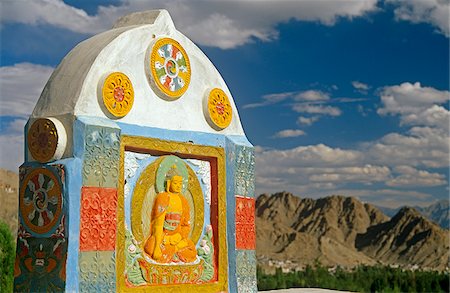 simsearch:862-03807589,k - India; Jammu & Kashmir, Ladakh, Leh. Decorative Buddhist motifs adorn a low pillar at the Shanti Stupa in the hills above Leh. Stock Photo - Rights-Managed, Code: 862-03807587