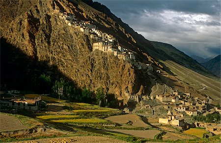 simsearch:862-03807589,k - India, Jammu & Kashmir, Ladakh, Zanskar, Karsha. Standing at the foot of steep, rugged mountains, 14th-century Karsha Gompa, or Monastery, is the largest in Zanskar. Stock Photo - Rights-Managed, Code: 862-03807602
