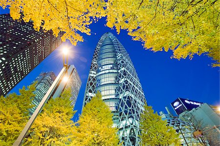 simsearch:862-07690285,k - Asia, Japan, Tokyo, Shinjuku, Tokyo Mode Gakuen Cocoon Tower, Design School building, yellow ginkgo leaves Stock Photo - Rights-Managed, Code: 862-03807679