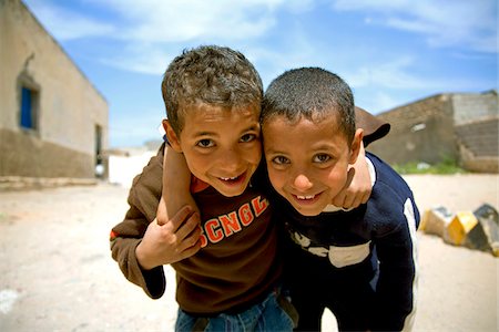 Tripoli, Libya; Two Libyan children posing for the camera at one of the old quarters of the Old Medina Stock Photo - Rights-Managed, Code: 862-03807847