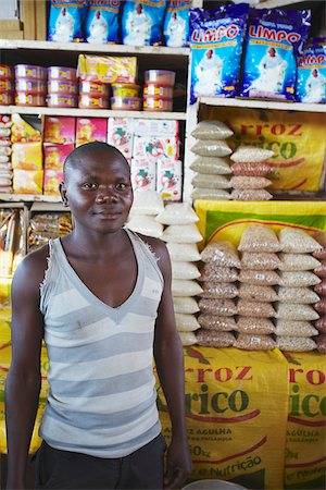 Vendor standing in front of stall in municipal market, Maputo, Mozambique Stock Photo - Rights-Managed, Code: 862-03807909