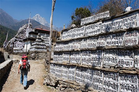 Asia, Nepal, Himalayas, Sagarmatha National Park, Solu Khumbu Everest Region, Unesco World Heritage, mani stone, hiker Stock Photo - Rights-Managed, Code: 862-03808087