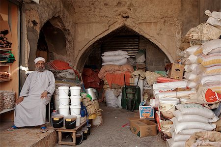 Oman, Nizwa. A shopkeeper in Nizwa's souq. Stock Photo - Rights-Managed, Code: 862-03808141