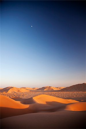 empty quarter desert - Oman, Empty Quarter. The martian-like landscape of the Empty Quarter dunes. Evening light. Stock Photo - Rights-Managed, Code: 862-03808166