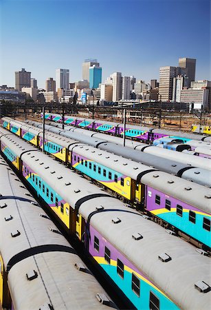 Former les wagons à la Station parc et toits de la ville en arrière-plan, Johannesburg, Gauteng, Afrique du Sud Photographie de stock - Rights-Managed, Code: 862-03808257