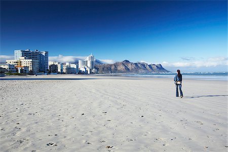 simsearch:862-03808309,k - Woman walking on beach, Strand, Western Cape, South Africa Stock Photo - Rights-Managed, Code: 862-03808497