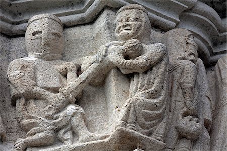simsearch:862-03288559,k - Sweden, Island of Gotland.  Graphic representation on a church stone carved frieze of the invasion of the island by armour clad medieval knights Stock Photo - Rights-Managed, Code: 862-03808629