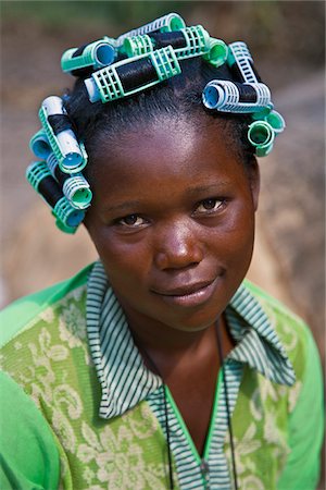 simsearch:862-03808656,k - A pretty young girl in curlers that match the colours of her dress. Stock Photo - Rights-Managed, Code: 862-03808710