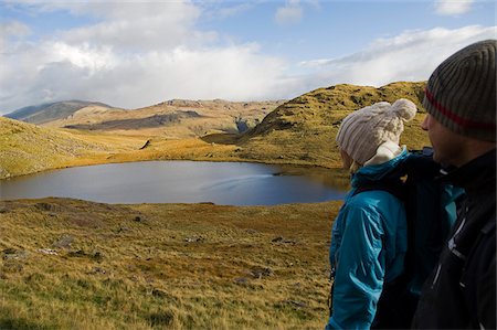 UK, North Wales, Snowdonia.  Man and woman trekking on the flanks of Mt Snowdon. Stock Photo - Rights-Managed, Code: 862-03808778