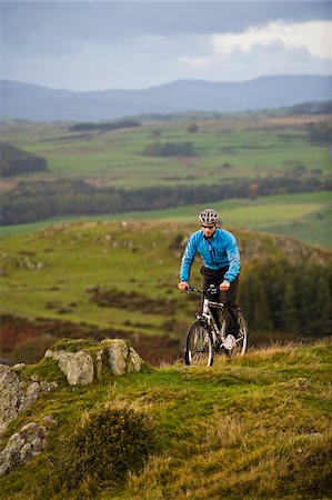 Gilar Farm, Snowdonia, North Wales.  Man mountain biking. Stock Photo - Rights-Managed, Code: 862-03808808