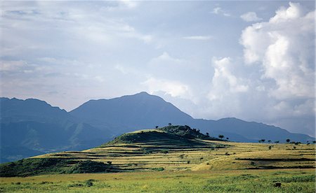 Ethiopia is a land of vast horizons and dramatic scenery. The weathered mountains in the Ethiopian Highlands exhibit layer upon layer of volcanic material, which built the plateau into Africas most extensive upland region. Stock Photo - Rights-Managed, Code: 862-03820380