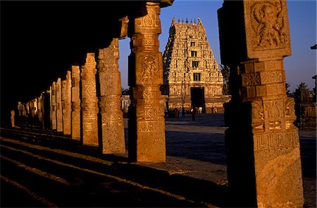 Gopura of the Chennakeshava Temple complex in Belur.Belur in Hassan district is famous for its magnificent Hoysala Temple Complex.The Chennakeshava temple was completed in 1116 by Hoysala Vishnuvardhana to commemorate his victory over the Chola. Stock Photo - Rights-Managed, Code: 862-03820616