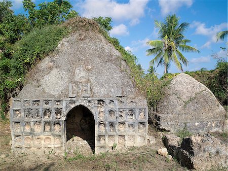 simsearch:862-03820754,k - An historic tomb of a prominent 19th century lady and her daughter on the outskirts of Siyu. The recesses on the exterior of the main tomb were inlaid with Chinese porcelain bowls, which have all been stolen or vandalised over the past fifty years. Stock Photo - Rights-Managed, Code: 862-03820747