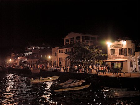 simsearch:862-03366742,k - Lamu waterfront at night.Situated 150 miles north northeast of Mombasa, Lamu town dates from the 15th century AD. The island's importance lies in the fact that it has the only certain source of sweet groundwater in the entire district. Stock Photo - Rights-Managed, Code: 862-03820759