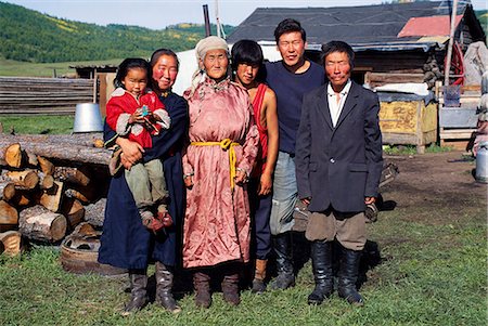 subsistence lifestyle - Mongolia, Khentii Mountains, north west of Ulan Bator, Mongolian family.The Khentii mountains are under 2,000m and are thickly forested and well watered.The watershed of three huge drainage basins, the Arctic Ocean, the Pacific Ocean and the inland basin of Central Asia, come together at Chandmani Mountain  in Khentii Province. Stock Photo - Rights-Managed, Code: 862-03820860