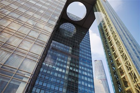 International Finance Centre (IFC) seen through gap in GRB Bank building, Zhujiang New Town area, Guangzhou, Guangdong, China Stock Photo - Rights-Managed, Code: 862-03887514