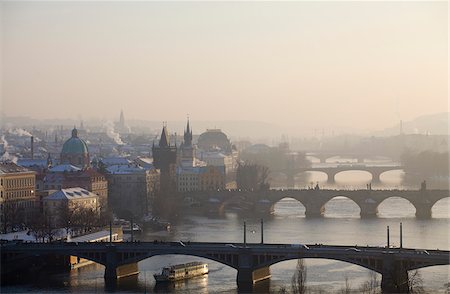 prague bridge - Czech Republic, Prague, Europe; Cityscape with bridges crossing the river Vltava Stock Photo - Rights-Managed, Code: 862-03887581