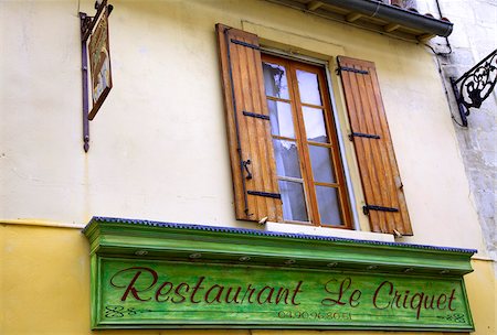 simsearch:862-03887747,k - Arles; Bouches du Rhone, France; A restaurant sign Foto de stock - Con derechos protegidos, Código: 862-03887742