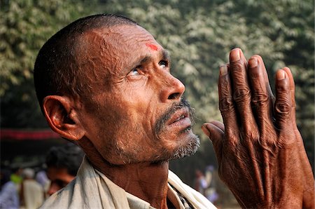 face of carnival - Praying at Sonepur Mela. India Stock Photo - Rights-Managed, Code: 862-03888454