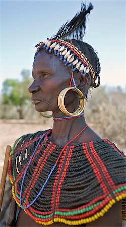 pastoralist - A striking old Pokot woman wearing the traditional beaded ornaments of her tribe which denote her married status. The Pokot are pastoralists speaking a Southern Nilotic language. Stock Photo - Rights-Managed, Code: 862-03888708
