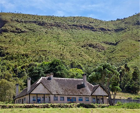 An imposing old settlers house in the Wanjohi Valley, often called The Happy Valley. The house was built in the 1930s by Alistair Gibb who died playing polo in England in 1941. The house now belongs to the Kenya Government and part of it is occupied by school teachers. Stock Photo - Rights-Managed, Code: 862-03888719