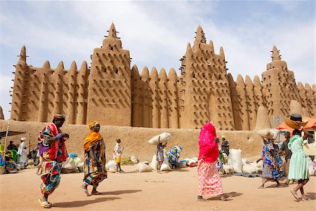 desert mosque - Market in front of the Djenee mosque,  a UNESCO World Heritage Site. Mali, West Africa Stock Photo - Rights-Managed, Code: 862-03888798