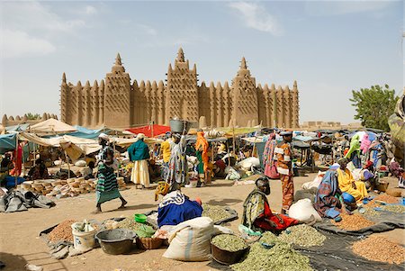 desert mosque - Market in front of the Djenee mosque,  a UNESCO World Heritage Site. Mali, West Africa Stock Photo - Rights-Managed, Code: 862-03888799