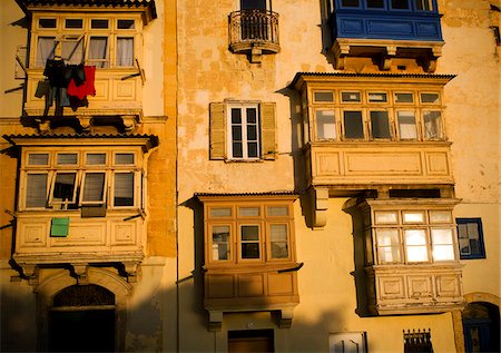 Malta, Europe; Traditional Maltese balconies in the last light of the day in Valletta Stock Photo - Rights-Managed, Code: 862-03888825