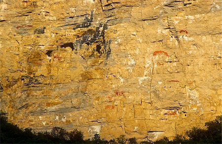 Peru, Amazonas Region, Chachapoyas Province, nr. Leymebamba, Rio San Miguel de Malpaso, La Petaca. Ancient Chachapoyan, or 'People of the Clouds', tombs and ochre-coloured paintings lie high in the cliffs by Rio San Miguel de Malpaso at a remote site called La Petaca. Stock Photo - Rights-Managed, Code: 862-03888981