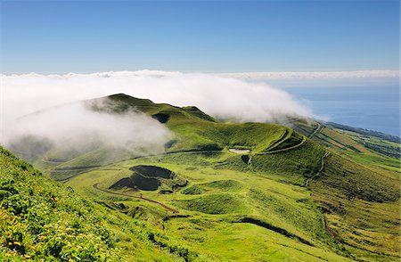 Volcanic craters along the Sao Jorge island viewed from Pico da Esperanca. Azores islands, Portugal Stock Photo - Rights-Managed, Code: 862-03889258