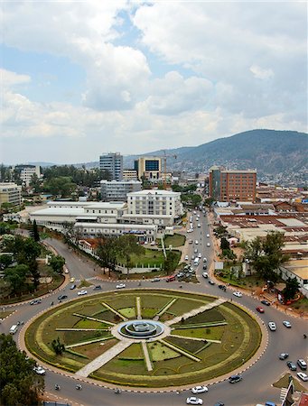 rond-point - Kigali, Rwanda. Vue aérienne du centre commercial UTC et rond-point central. Immeubles de grande hauteur sont développent vers le haut dans le centre de la ville. Photographie de stock - Rights-Managed, Code: 862-03889450