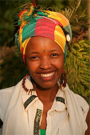 ethiopian - Kigali, Rwanda. An Ethiopian woman is photographed in her garden. Stock Photo - Rights-Managed, Code: 862-03889484