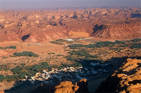 saudi arabia photography - Saudi Arabia, Madinah, Al-Ula. A view of the town and oasis of Al-Ula from the surrounding hills. Stock Photo - Rights-Managed, Code: 862-03889527