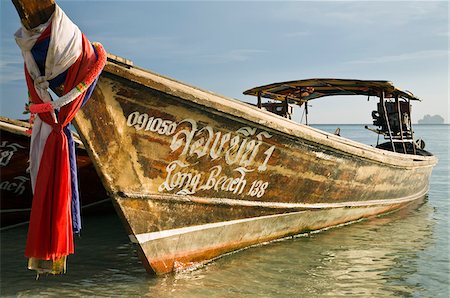 simsearch:862-05999536,k - Thailand, Krabi, Ko Phi Phi Don.  Long-tail boat at Hat Yao (Long Beach). Stock Photo - Rights-Managed, Code: 862-03889880