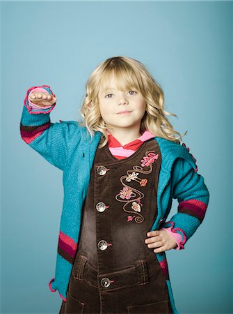simsearch:877-06833353,k - Little girl with arm raised Photographie de stock - Rights-Managed, Code: 877-06834079