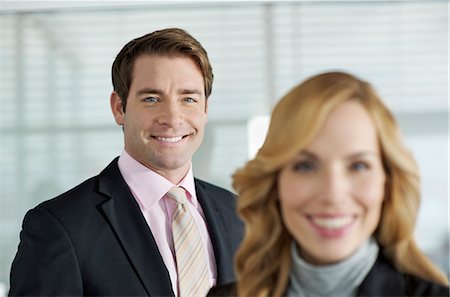 simsearch:877-06834651,k - Business couple smiling at camera Stock Photo - Rights-Managed, Code: 877-06834677