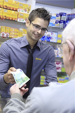 shopkeeper man - France, drugstore, pharmacist with a customer Stock Photo - Rights-Managed, Code: 877-06835436